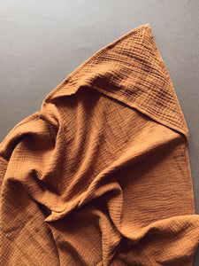 muslin swaddle with hoodie caramel